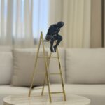 Thinking Man on Stairs